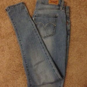 Light wash blue Levis.