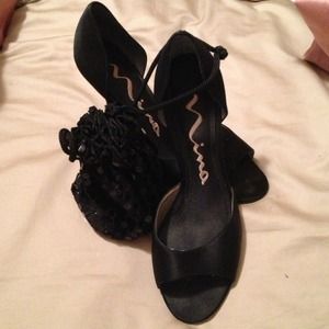 Satin black evening pumps with matching wristlet