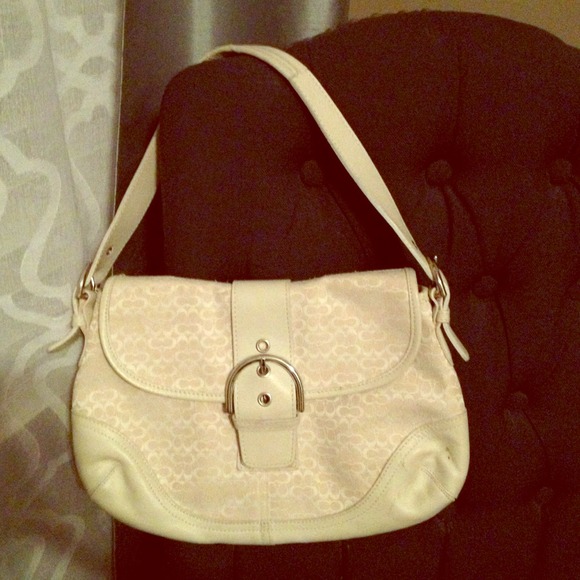 Off white leather and silver accent coach handbag