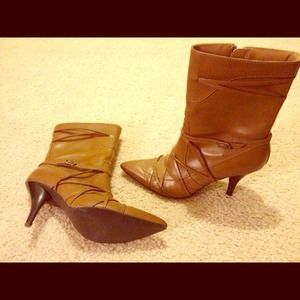 Worn Once! Brown boots with a 4 inch heel.