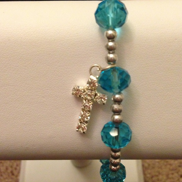 Baby blue bracelet with bling cross