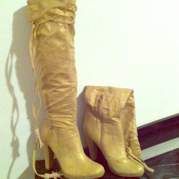 Very sexy knee high gold boots