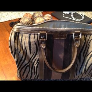 ***REDUCED**Authentic Gucci zebra print calf hair.