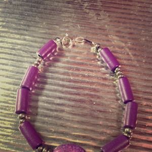 Beautiful hand crafted, handmade purple bracelet.