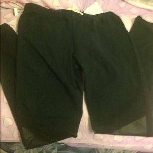 Black leggings with leather detailing