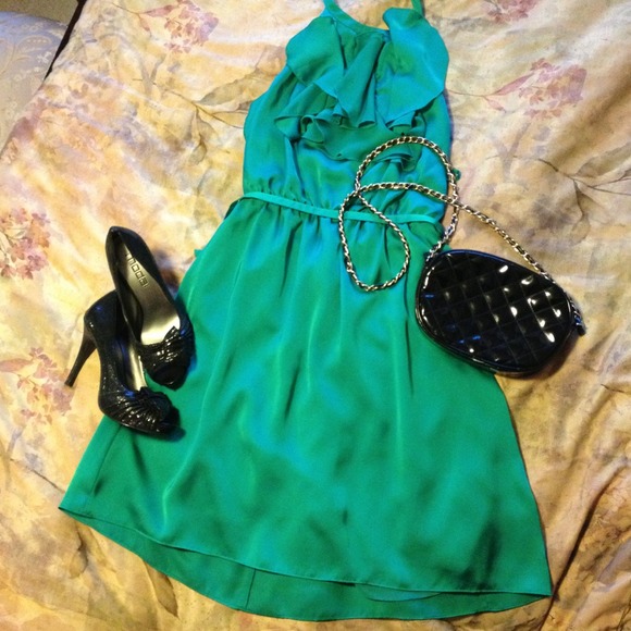 Beautiful green cocktail dress with ruffle accent