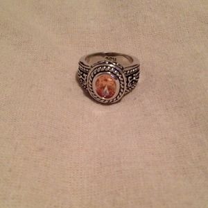 Size 6 silver ring with light brown stone