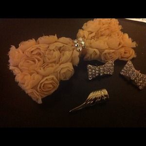 Hair clip, bow earrings, and an ear cuff