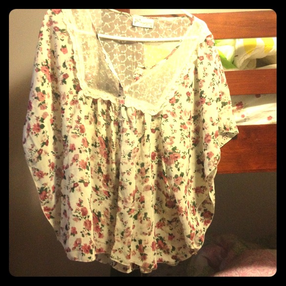 Colorful top with roses and neck detail
