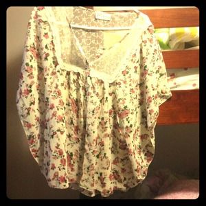 Colorful top with roses and neck detail