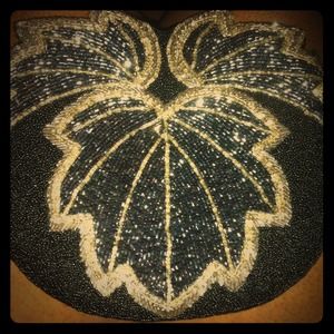 Hand beaded leaf design clutch