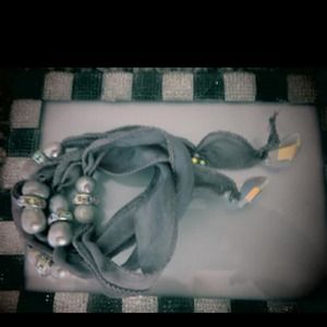 Silk ribbon.  One of a kind!