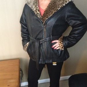 Black leather jacket with animal print fur inside