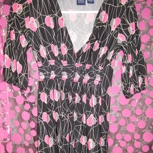 Black, pink, and grey polka dot dress.