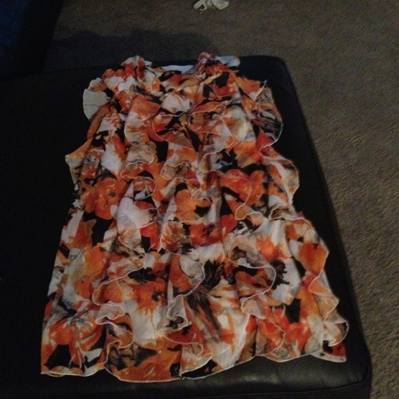 Floral dress in orange, white, and black hues