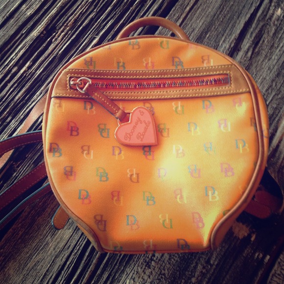 Dooney and Bourke orange backpack bag