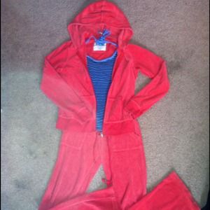 A coral pink Reflex track suit with AE halter top