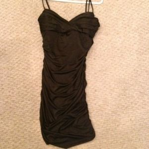 Form fitting black dress. Never worn.