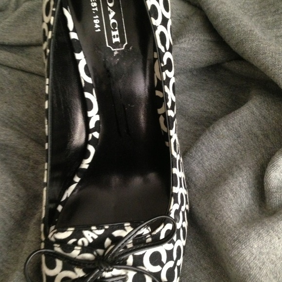Beautiful Coach peep toe pumps.