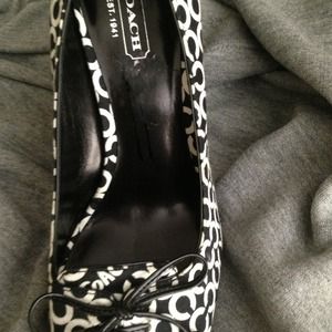Beautiful Coach peep toe pumps.