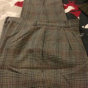 Pants and necklaces.