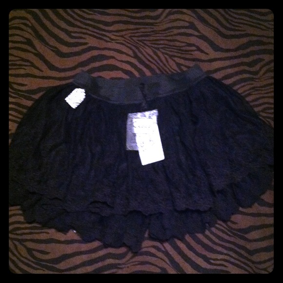 Tiny black lace skirt