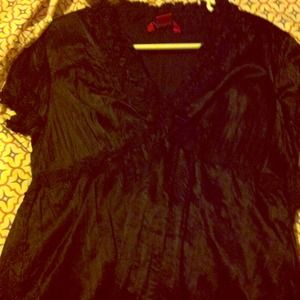 Fun top!! Polyester and spandex!