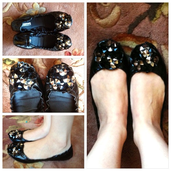 Not Rated black flats