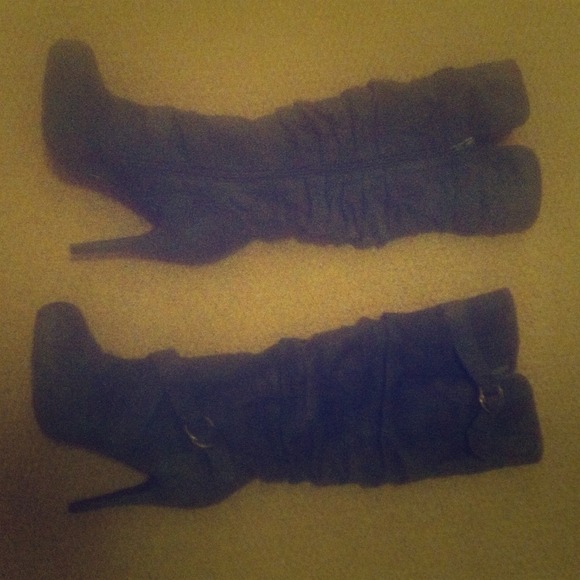 Knee high grey heel boots.