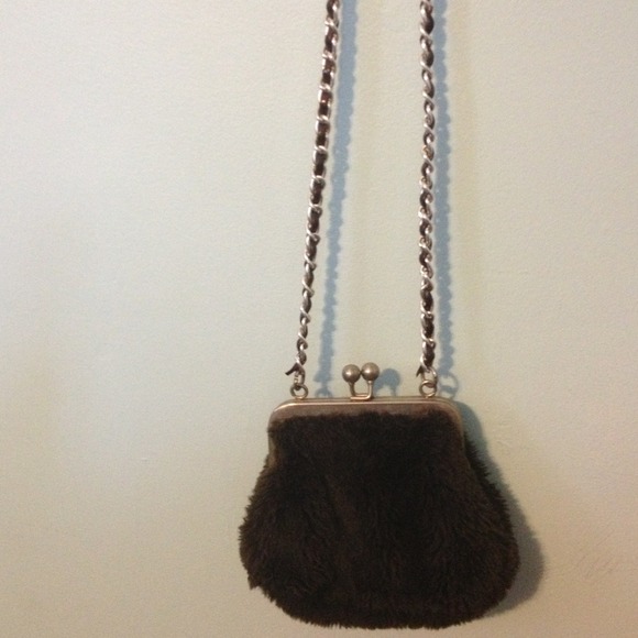 Furry black handbag with long strap