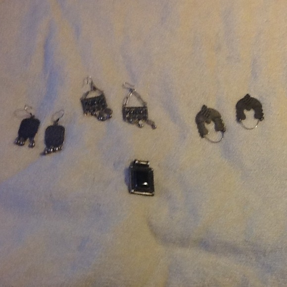 Earrings and necklace charm.
