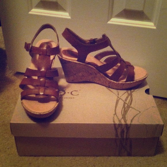New, Born Concept, brown leather sandals.