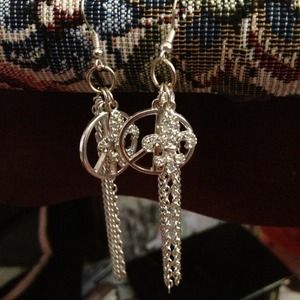 Silver dangling peace symbol earrings
