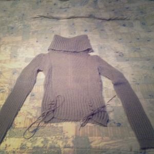 Cozy light blue sweater with ribbons