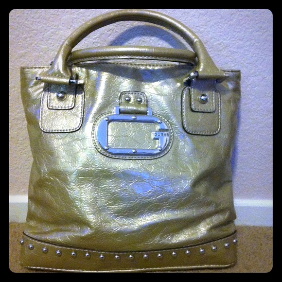 Gold Guess purse and 8 belts