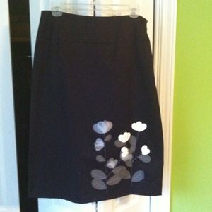 Timeless black pencil skirt with floral detail