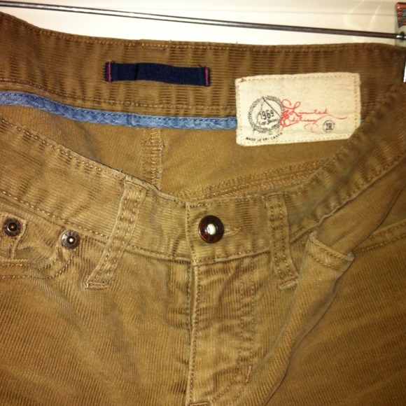 Tan-colored corduroy bootcut pants