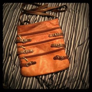 Brown "crossbody" purse with buckles and zippers