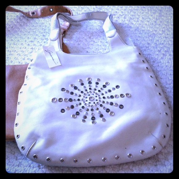 New off white purse still with tags!