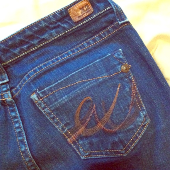 Dark wash low rise skinny jeans