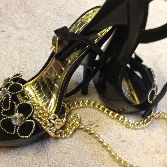 Black and gold stiletto heels