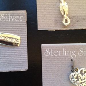 Brand new!! Sterling silver charms. All for $20