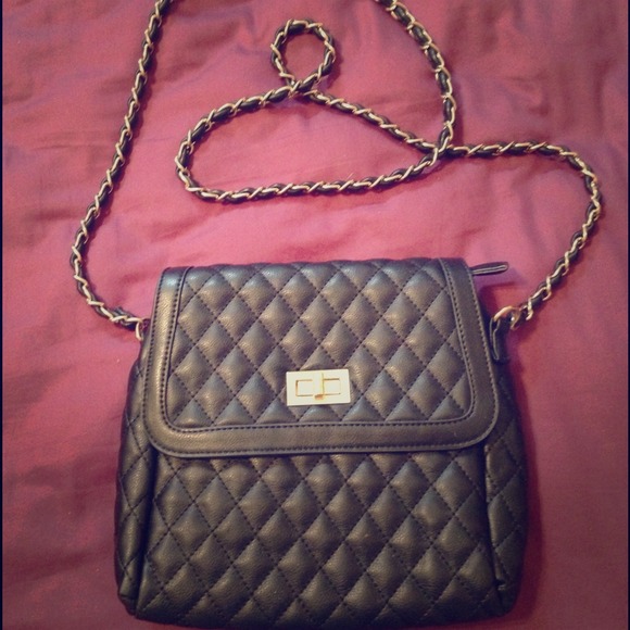 Black and gold chain link purse