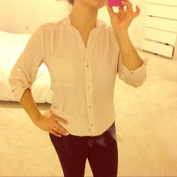 Salmon and black button down blouse. Both Large