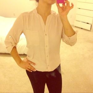 Salmon and black button down blouse. Both Large