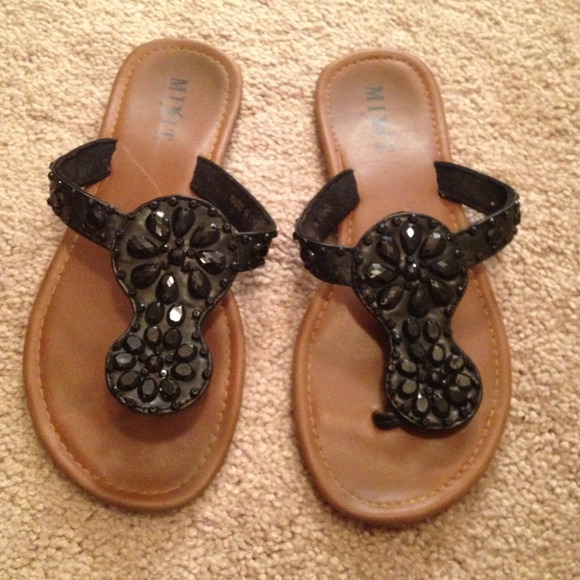 Black stone flip flops