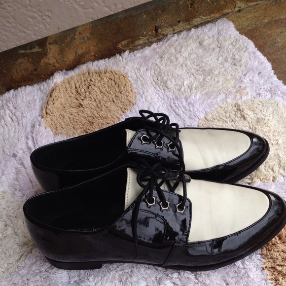 Shinny black and white shoes