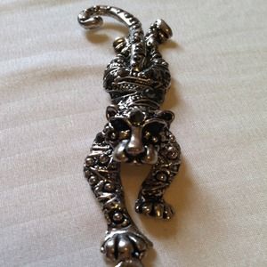 Long jaguar necklace.
