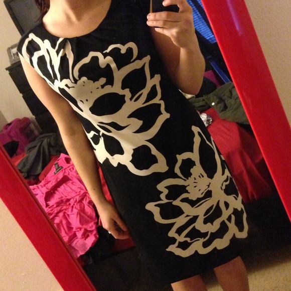 Black silky flowy dress with white flowers on it
