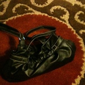 Nice small black leather purse. Never used